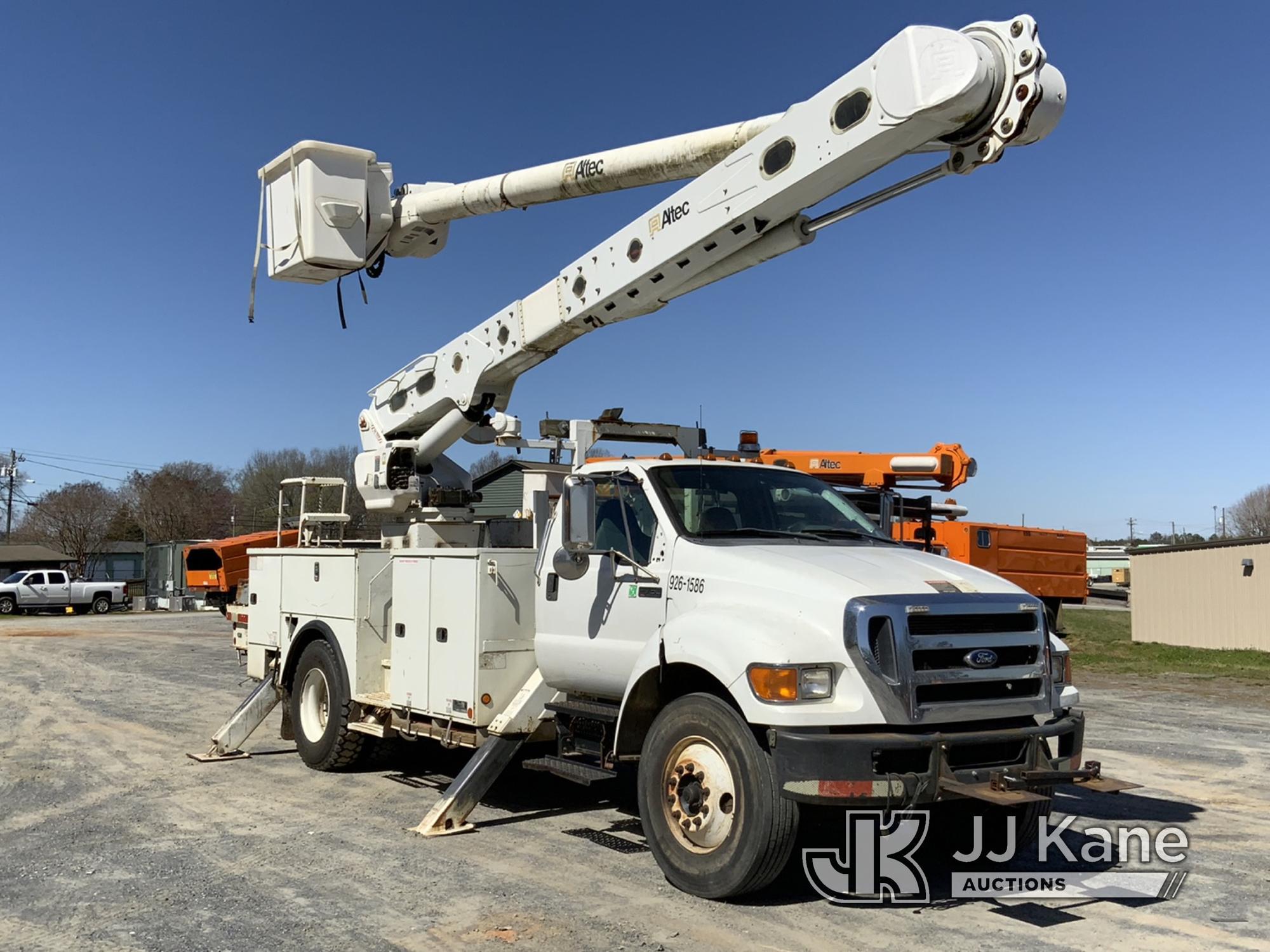 (Shelby, NC) Altec AM55, Over-Center Material Handling Bucket Truck rear mounted on 2011 Ford F750 U