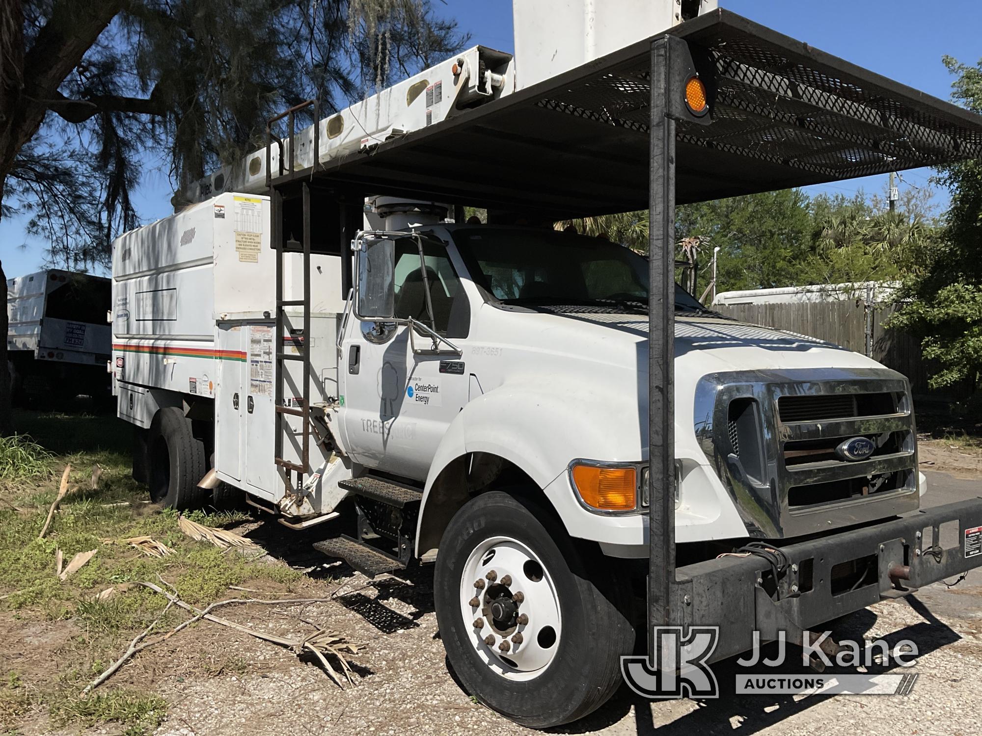 (Tampa, FL) Altec LR756, Over-Center Bucket Truck mounted behind cab on 2013 Ford F750 Chipper Dump