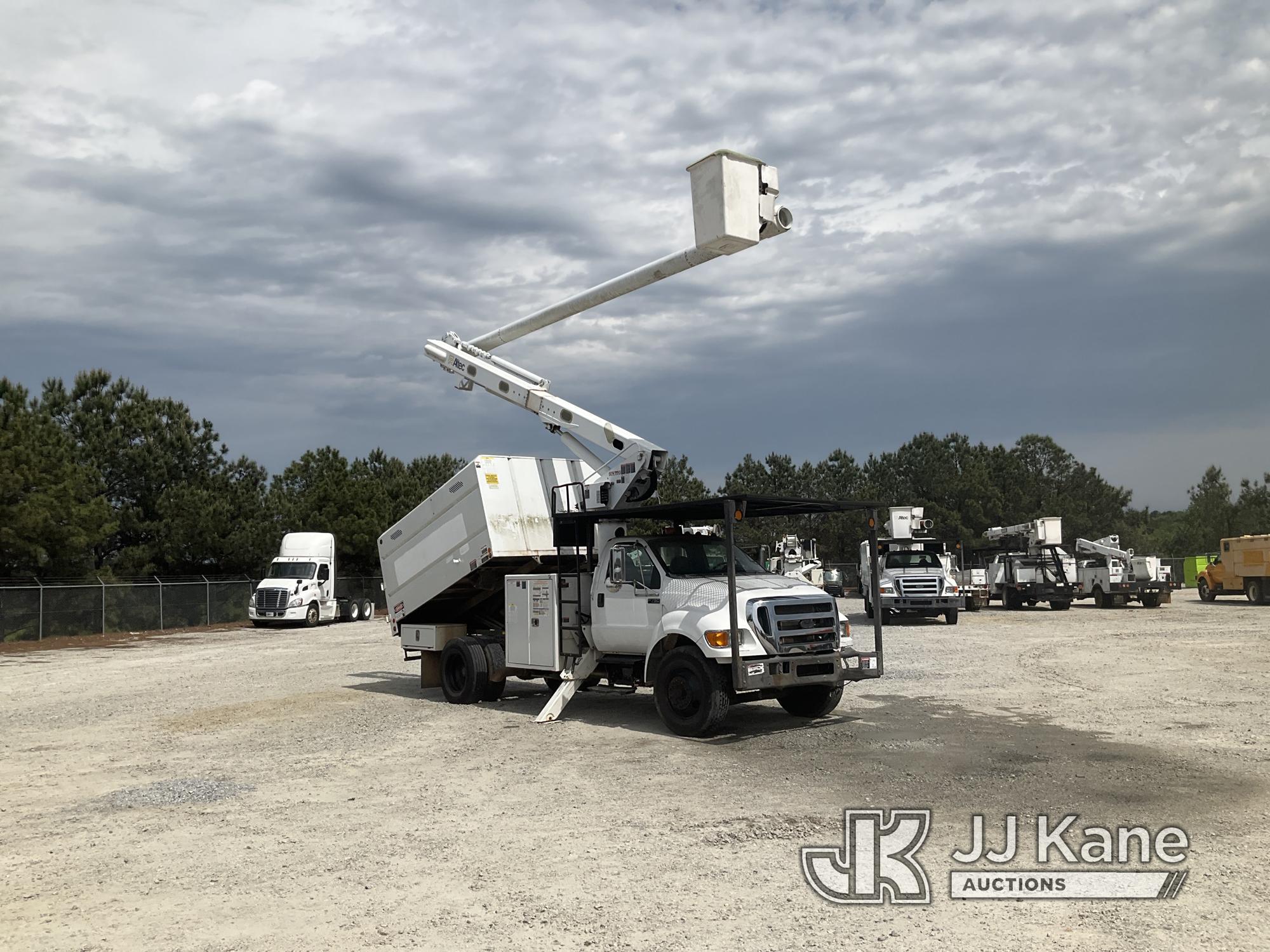 (Villa Rica, GA) Altec LR756, Over-Center Bucket Truck mounted behind cab on 2015 Ford F750 Chipper