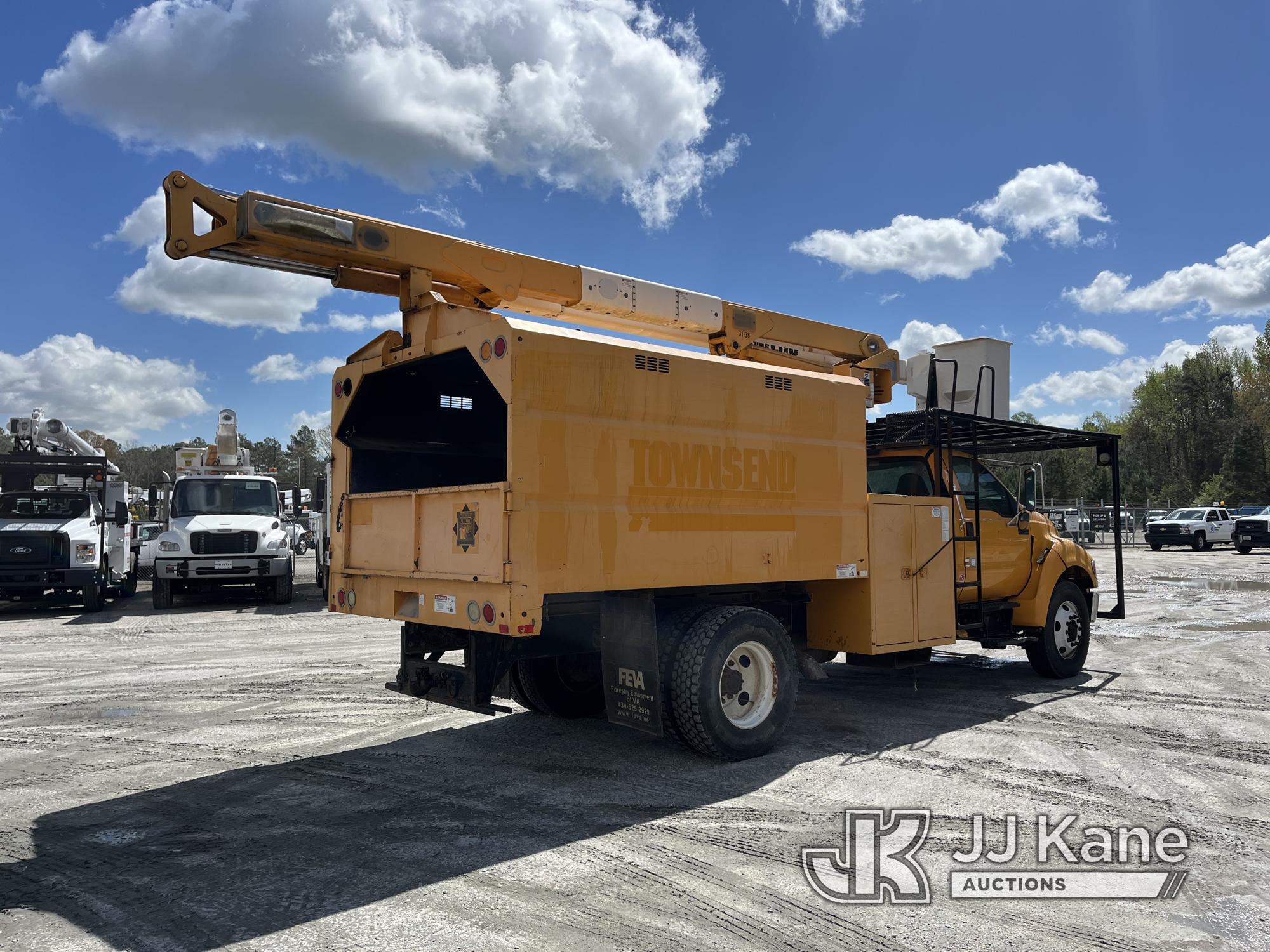 (Chester, VA) Terex XT55, Over-Center Bucket Truck mounted behind cab on 2013 Ford F750 Chipper Dump