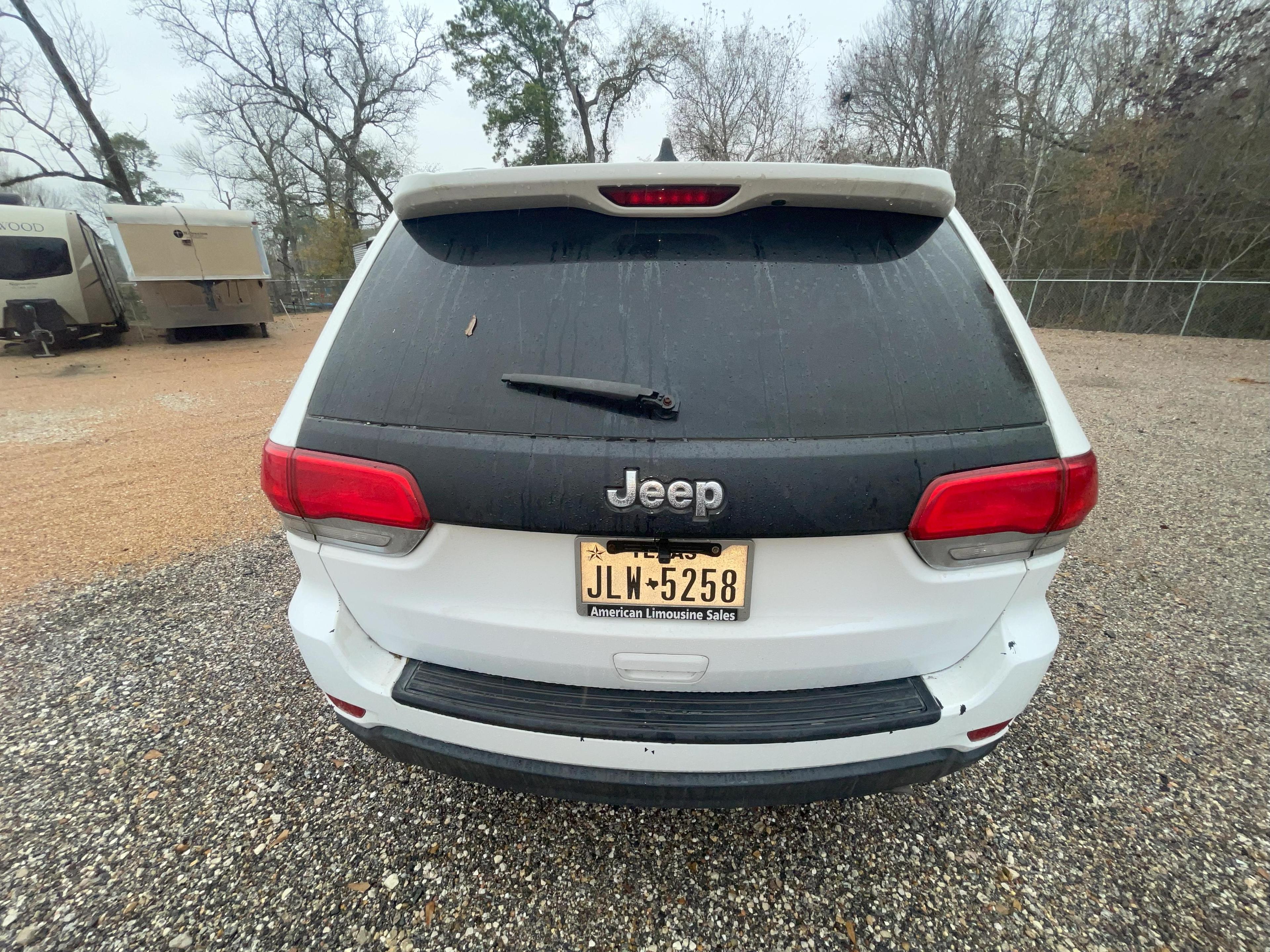 LOCATION PORTER, TX; 2015 Chrysler Jeep Grand Cherokee 4-Door Limousine, VIN# 1C4RJEAG0FC694029, 650
