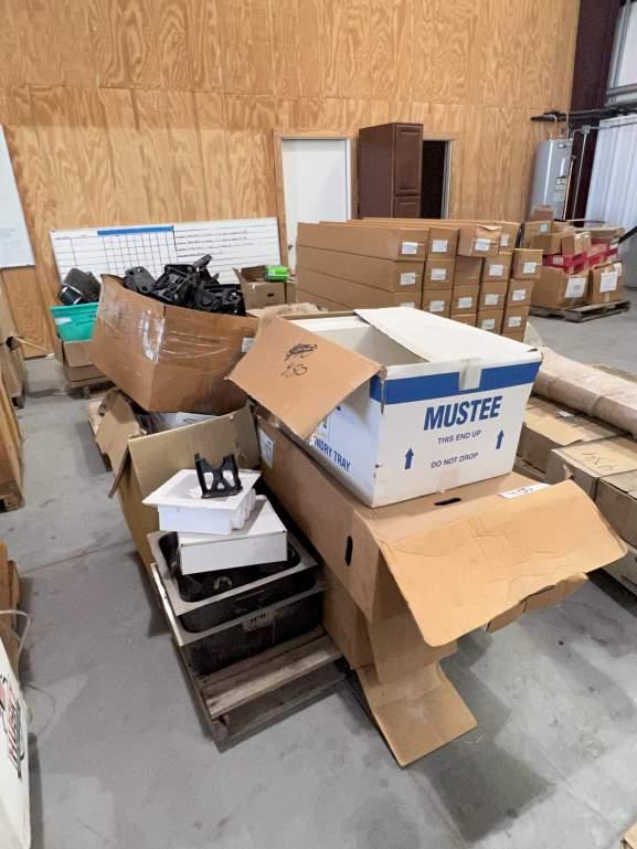 PALLET OF ASSORTED PLUMBING PARTS INCLUDING SINKS; PIPE STANDS; VALVE BOXES; QUICK STAND SUSPENDED E