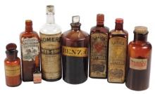 Apothecary Bottles (8), brown w/paper labels, incl Lash's Bitters & Homer's