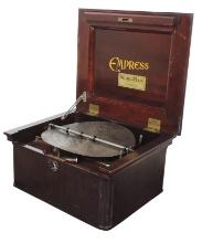 Music Box, Empress wind-up 12" disc player in mahogany case, mfgd by Wurlit
