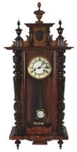 Clock, Vienna Style Regulator, walnut w/enameled chapter ring & turned deco