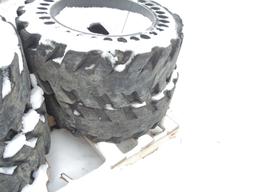(4) Hard Rubber Airless Skidloader Rims & Tires