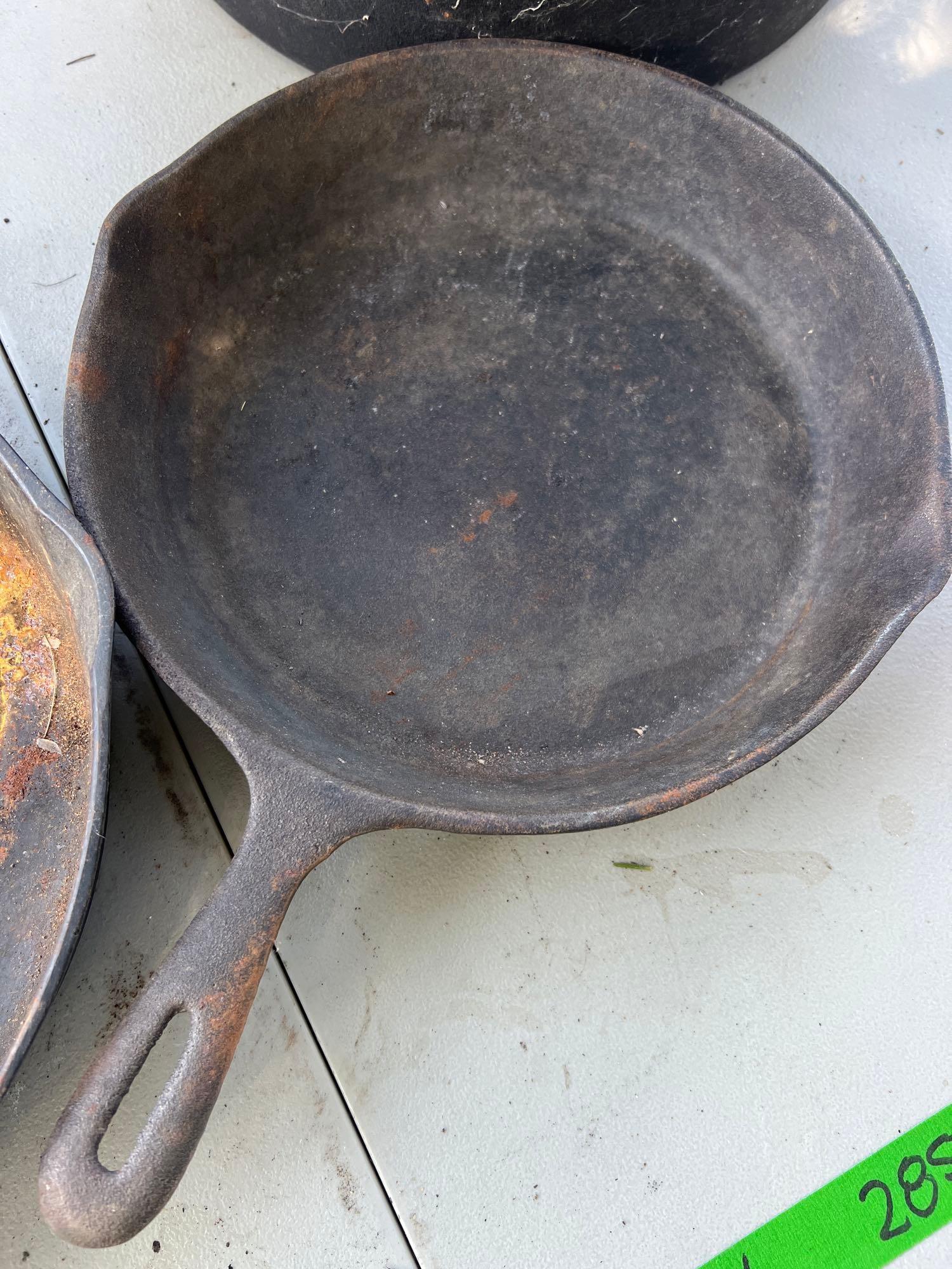 large lot of camping cast iron skillets pot and rod iron hangers