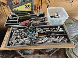 Work table with contents, tools, and more
