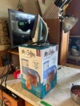 iced tea maker and iron in kitchen