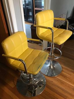 2- yellow barber chairs upstairs
