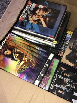 L- CDs/Dvd movies /case are in box