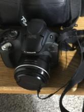 Canon camera/tripod Laskey
