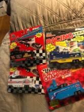 4- racing Champions Nascar racing team transporters 1/64 scale