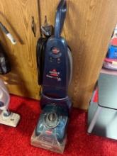Bissell carpet cleaner in basement