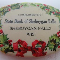 Three Sheboygan Falls bank advertising items, pocket mirror and key tags