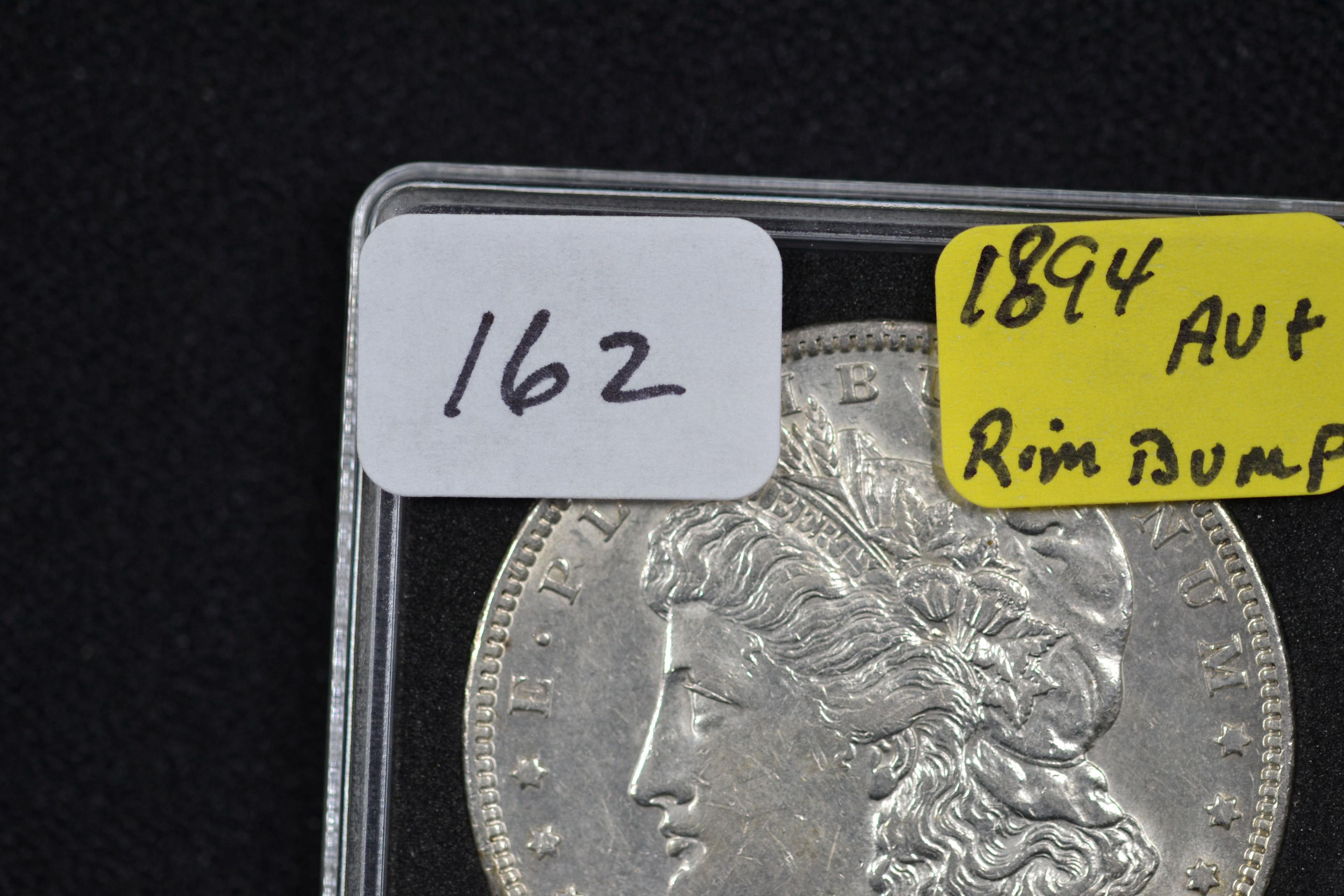 1894 Morgan Silver Dollar; AU+; Rim Bump