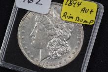1894 Morgan Silver Dollar; AU+; Rim Bump