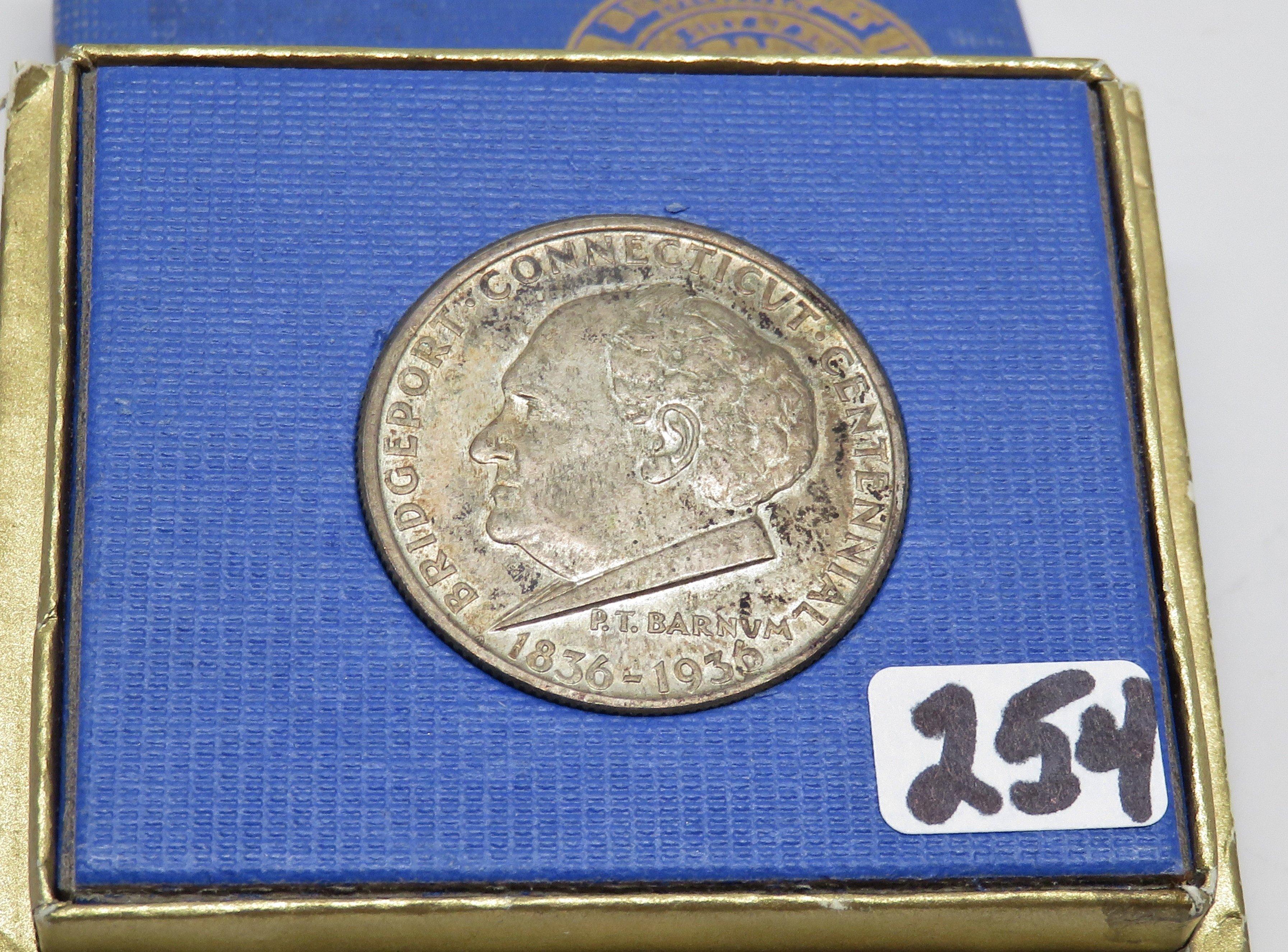 1936 Bridgeport Commemorative Half $ in original holder, toned.  Rare