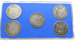 5 Morgan $ in display; 1878; 78- S; 84- O; 85- O; 86-O all cleaned; average circ; display has proble