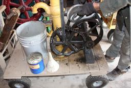 Pohlman gas engine, crooked gear, pump jack on cart, with water pump.