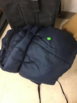 Sleeping bag and travel luggage.