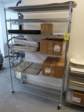 wire shelving unit on casters w/ contents- cake forms