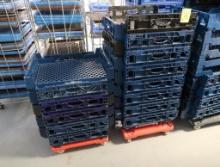 stacks of bakery trays on carts