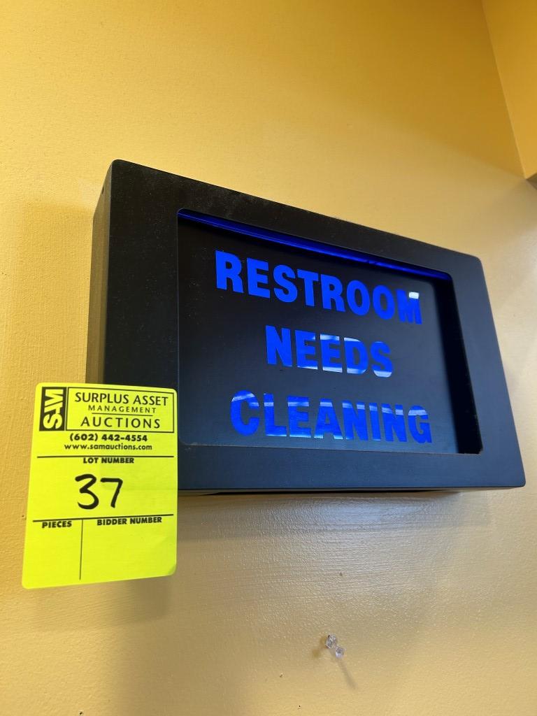Lighted Restroom Needs Cleaning Sign