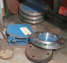 group of four stainless steel pipe flanges for 6 5/8”od pipe