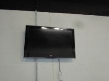 26 IN LG T.V. ON WALL