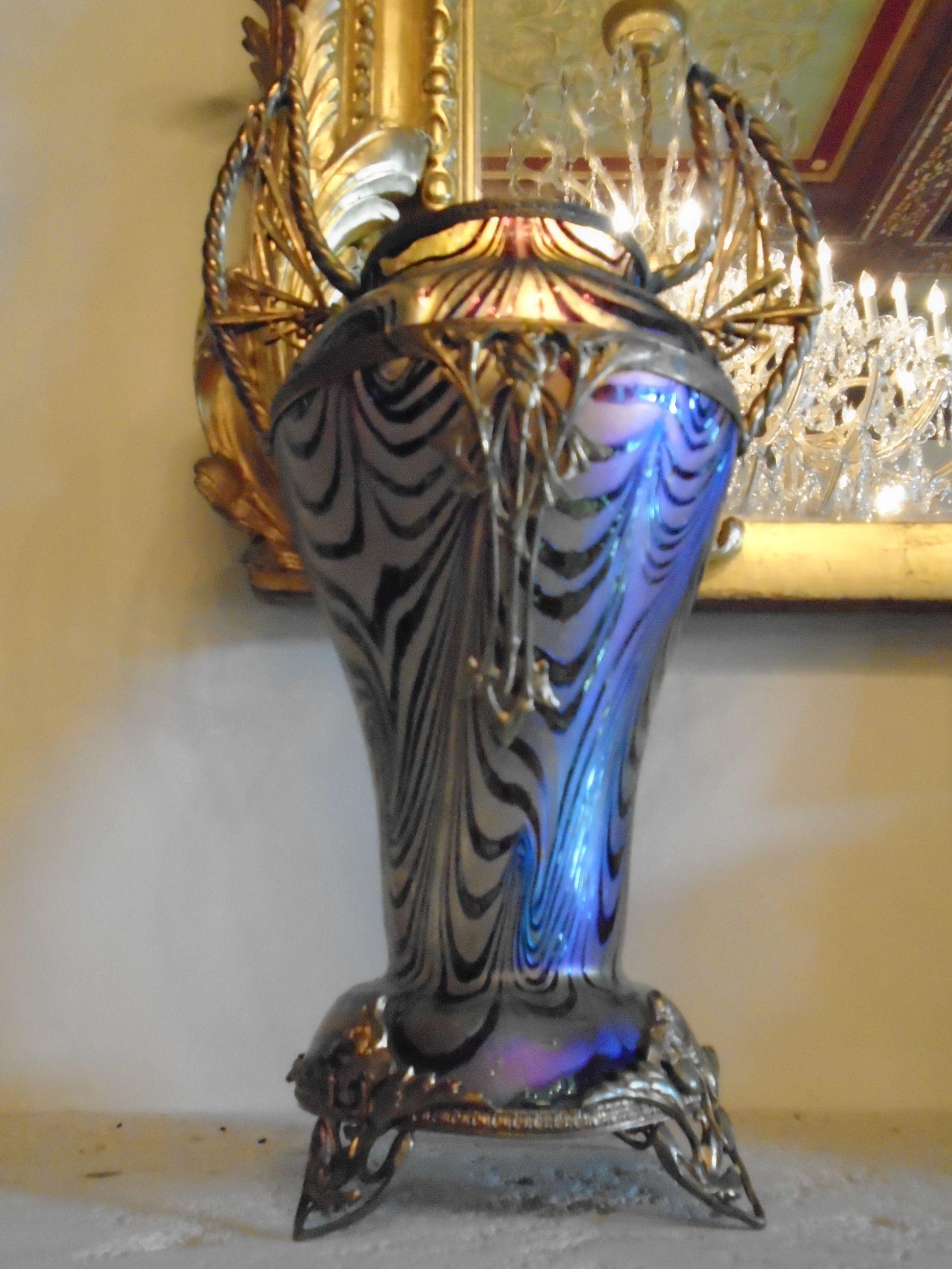 Loetz Art Glass vase with metal handles and details.