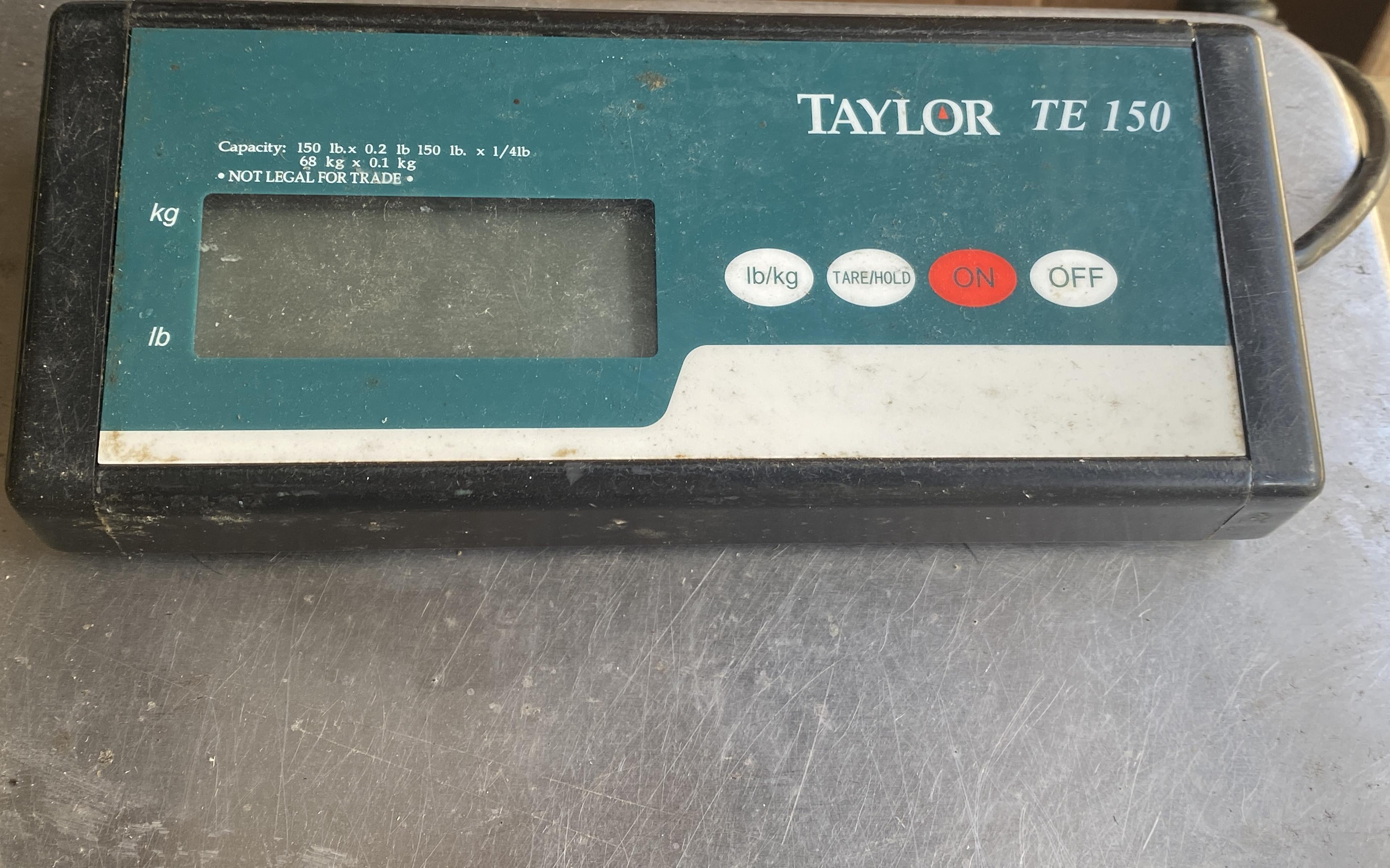 Taylor TE 150 digital platform scale with a 12” x 12” stainless steel platform weighs up to 150 poun