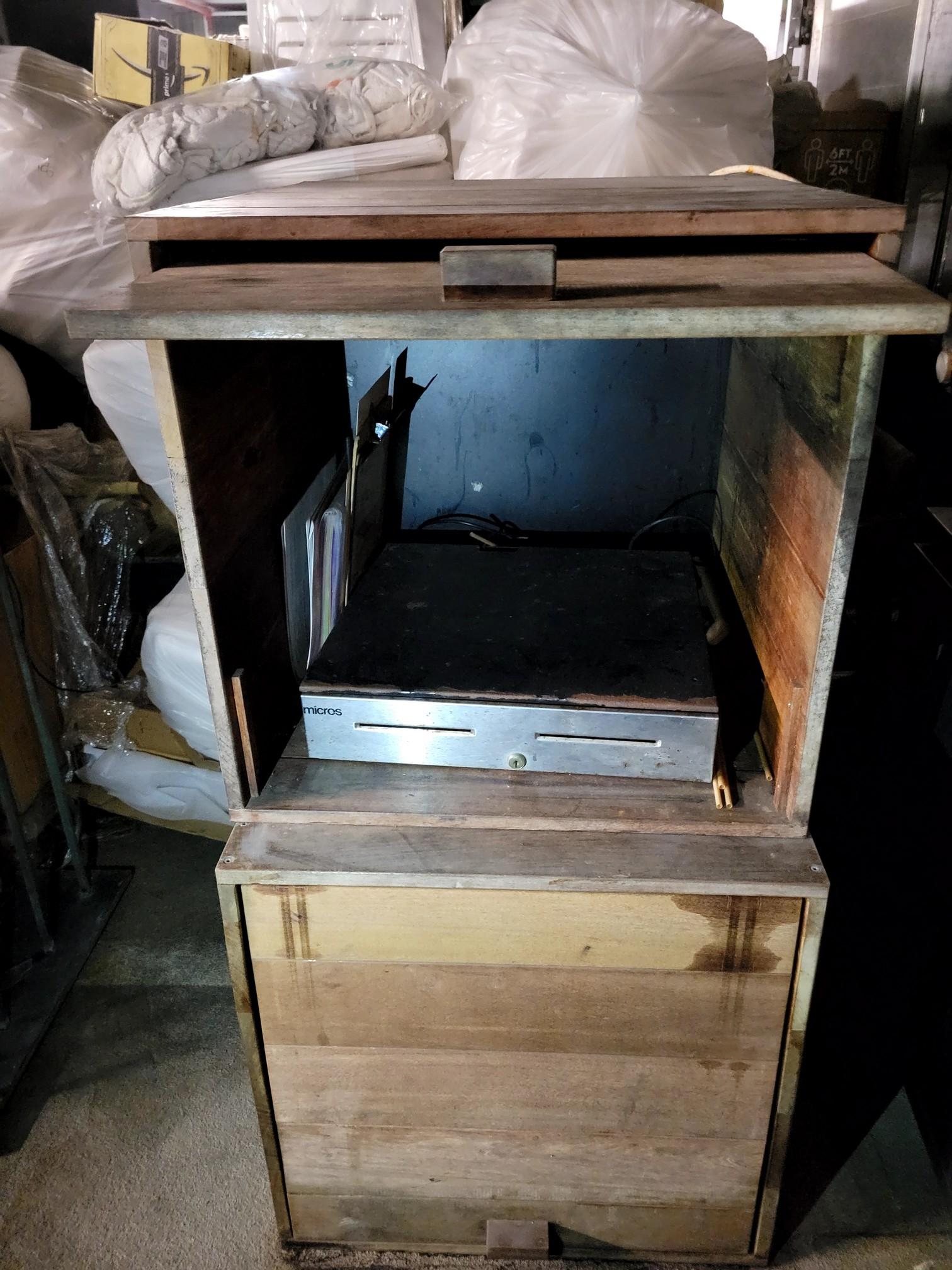 Wood Cabinets Used As Cashier Stands