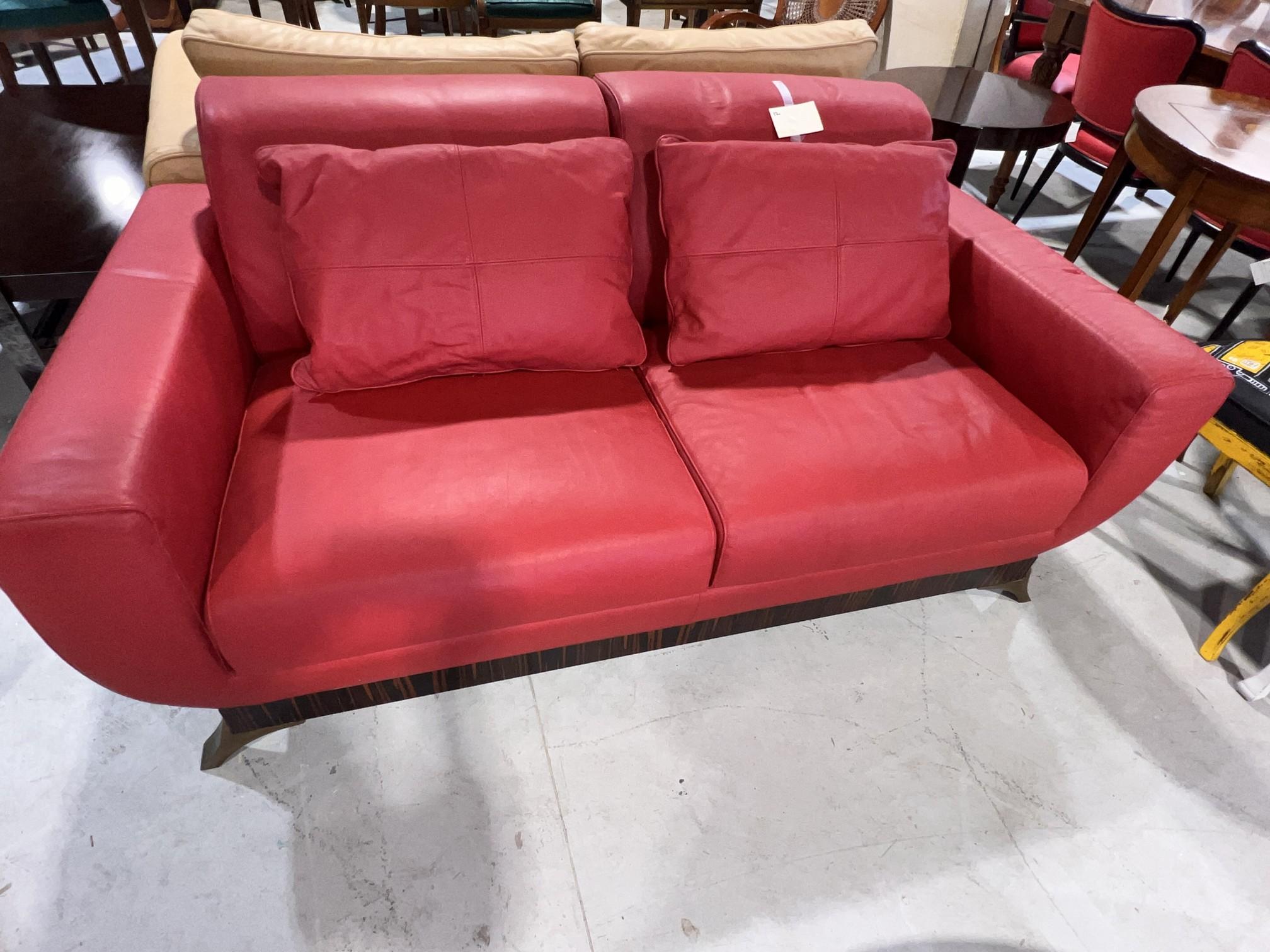 Two Seater Red Leather Sofa with Ebony Makassar Base with Bronze Legs