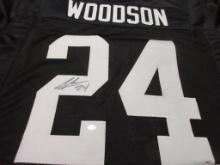Charles Woodson of the Oakland Raiders signed autographed football jersey PAAS COA 342