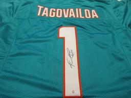 Tua Tagovailoa of the Miami Dolphins signed autographed football jersey PAAS COA 596