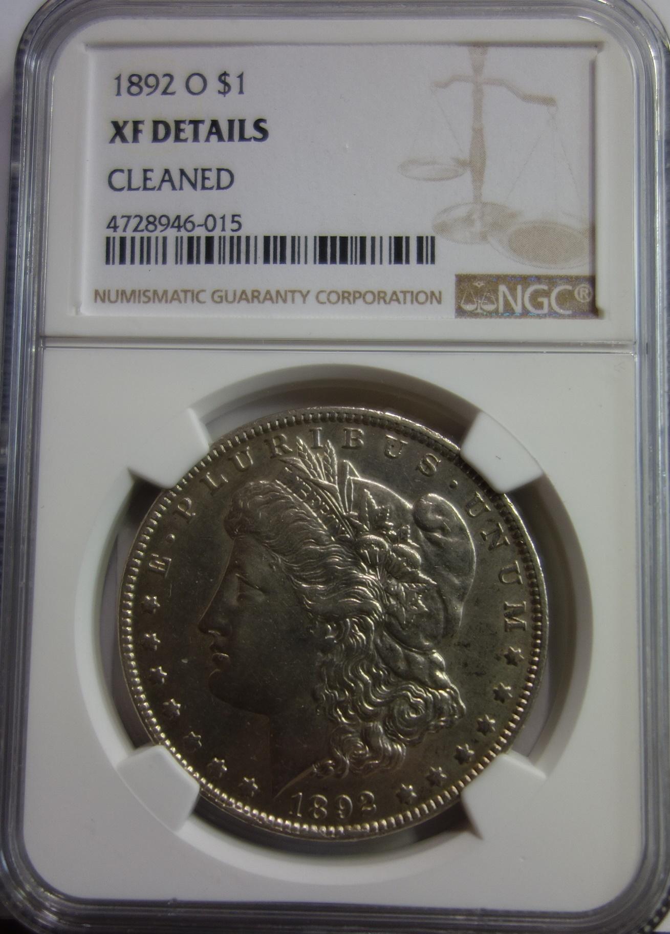 NGC GRADED XF DETAILS, CLEANED, 1892-O MORGAN SILVER DOLLAR