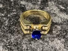 One Beautiful Ring Set with Fine Blue Sapphire and Side Diamonds in 14k Yellow Gold