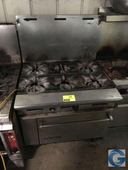 60" Vulcan range with 24" griddle, grill, and oven