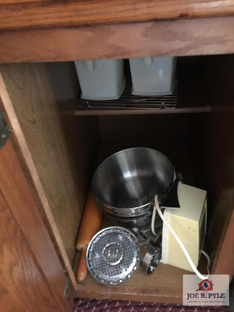 Contents of seven 7 drawers and three 3 cabinets under counter: Dish cloths, cookware, kitchen