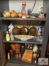 Lot of glass, wood, and pottery items on 3 shelves