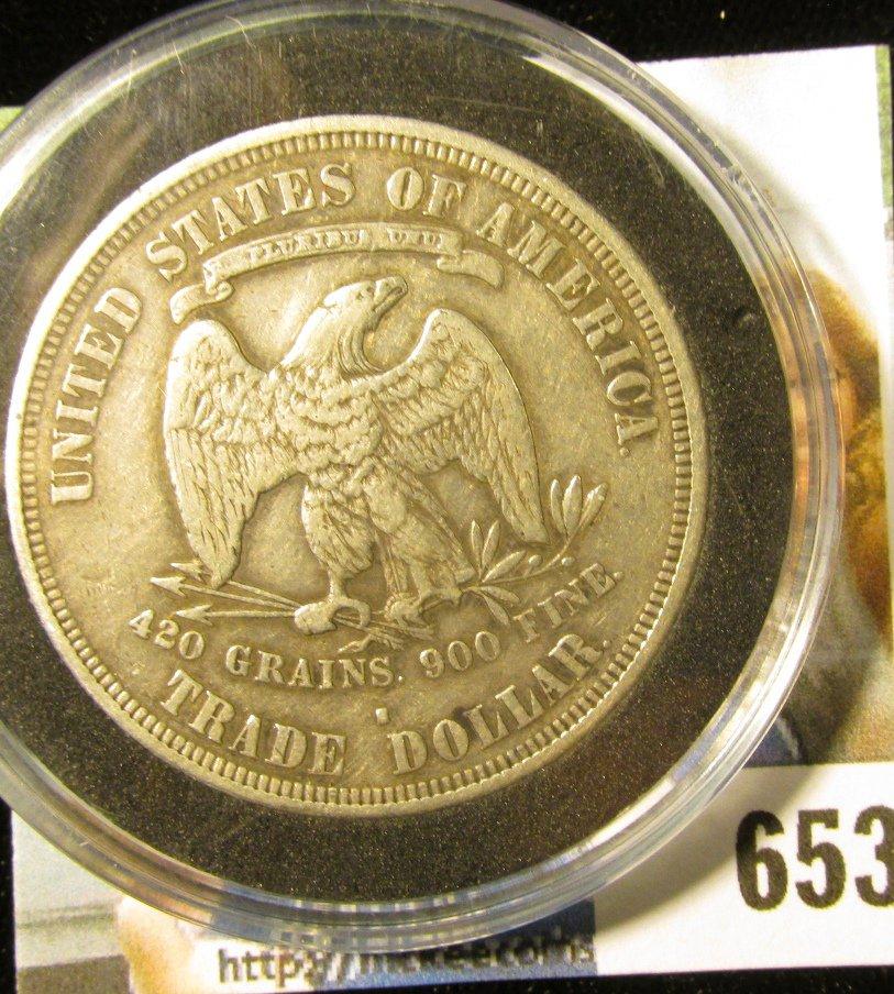 1877 S U.S. Silver Trade Dollar, F-VF. A nice authentic specimen of a rarely found coin. Still store