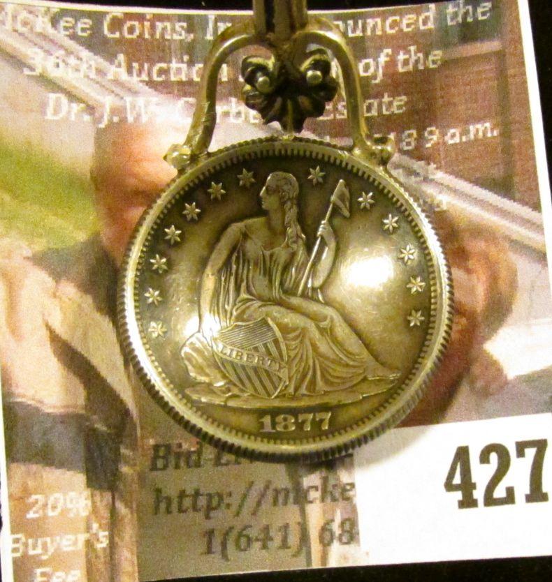 Gorham Sterling Silver spoon (marked sterling and hallmarked) featuring an 1877-S Seated Liberty Hal