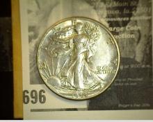 1944 P High Grade Silver Walking Liberty Half Dollar.