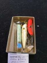 box of vintage, fishing plugs and lures