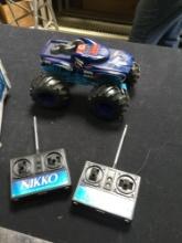 Hot wheels, monster truck, and two NyeCo RC controllers controllers do not go with truck