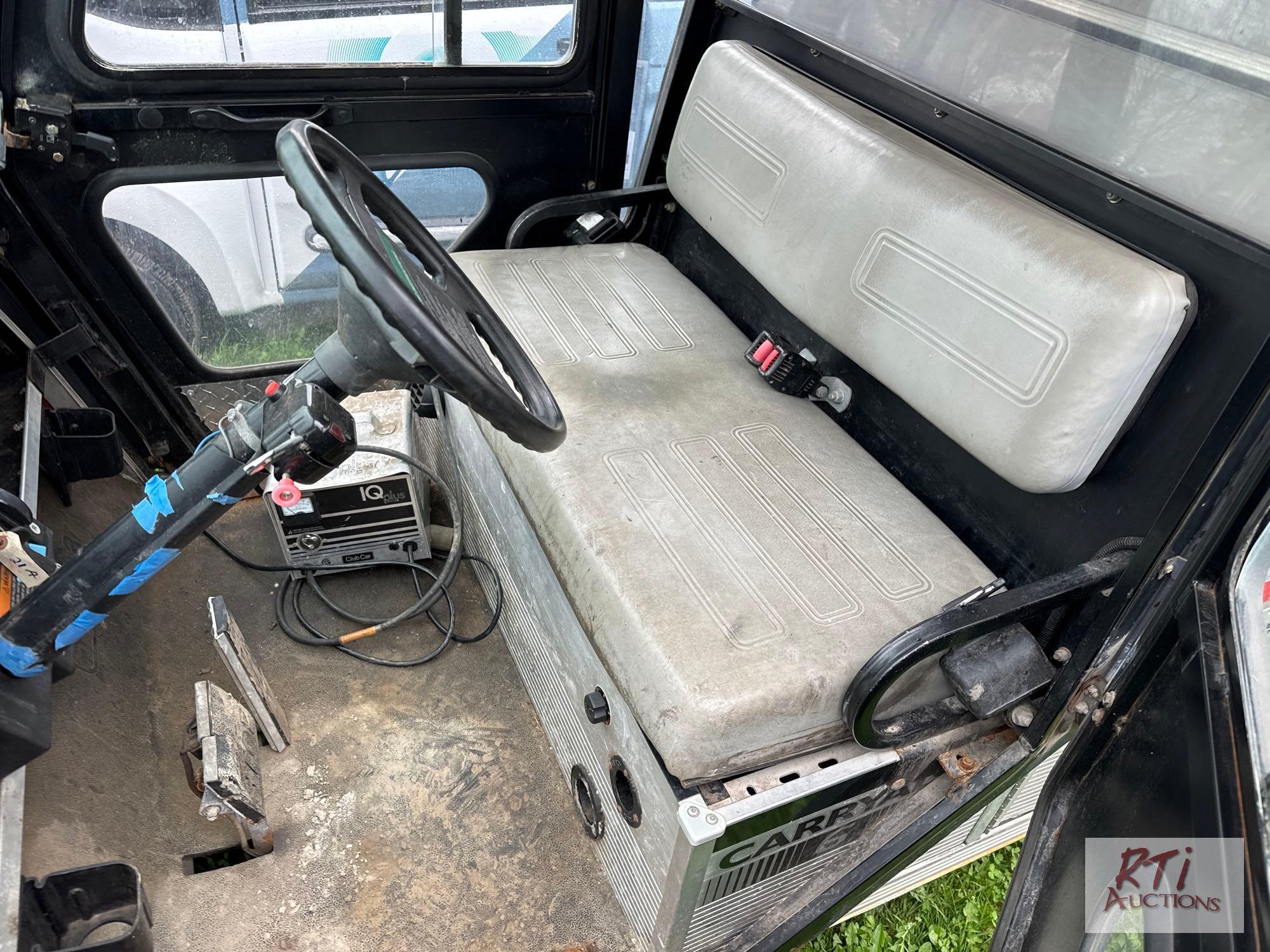 Club Car extended electric golf cart with enclosed body, enclosed cab, charger, brand new batteries