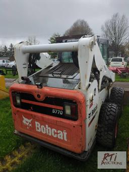 Bobcat S770 skid steer loader, cab, bucket, 2 speed, power wedges, A/C, diesel, joystick controls,