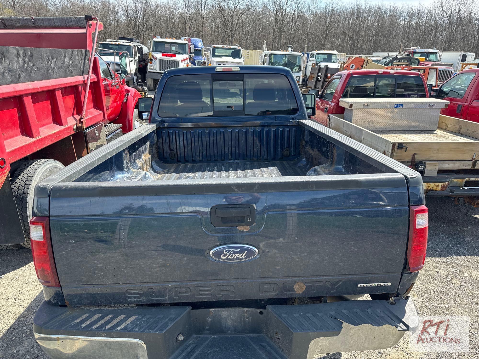 2014 Ford F250 regular cab, 8ft box, 4X4, with western snow plow, PW , PL, A/C, auxiliary switches,