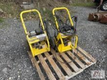 Pair of small gas powered pressure washers